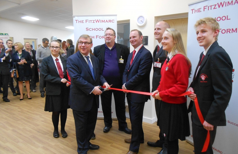 Mark Francois pictured cutting a ribbon at the opening ceremony of the new FitzWimarc School sixth form.