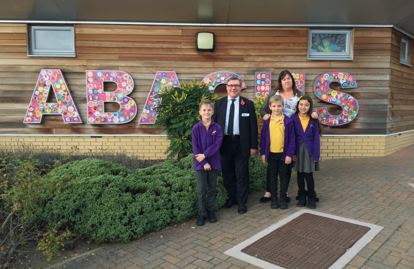 Mark pictured with Headteacher Heidi Blakeley and pupils during a recent visit to Abacus Primary School in Wickford.