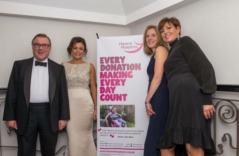 Mark Francois MP pictured with Sarah de Cristofano and her team of organisers of the “Glitter Ball” which raised £26,000 for Little Havens Hospice.