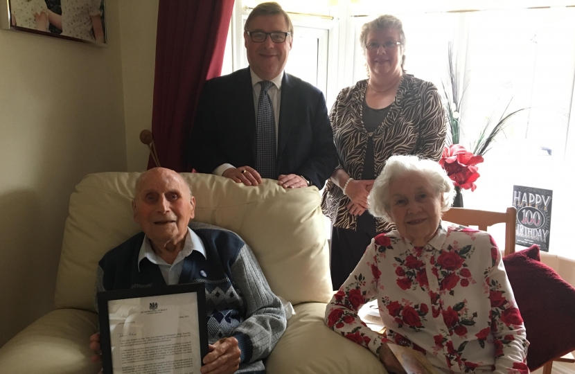 Rayleigh and Wickford MP Mark Francois pictured with Ernie Lane, his wife and Cllr Cheryl Roe on his 100th Birthday, with his letter of congratulations from Prime Minister Theresa May.