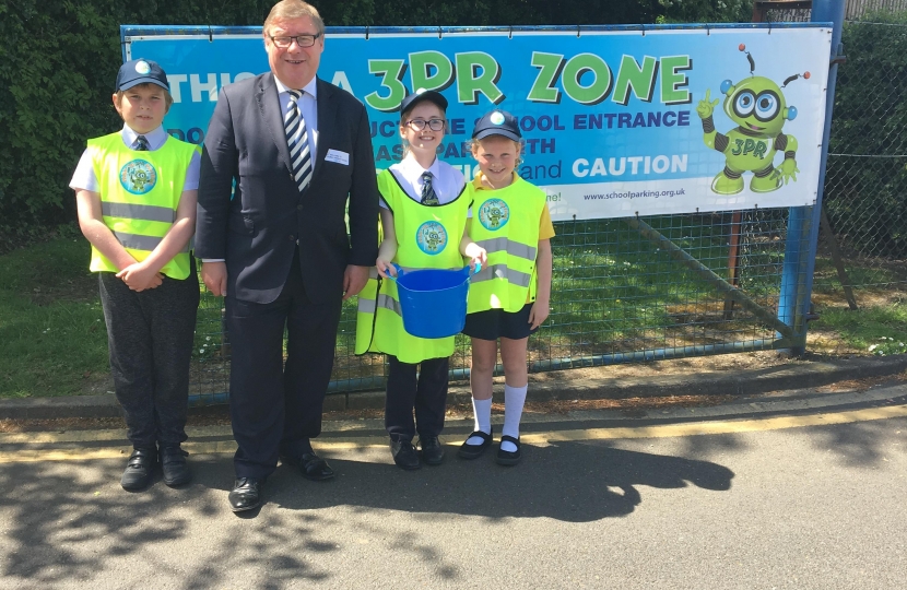 Rayleigh and Wickford MP Mark Francois pictured with pupils from Wyburns Primary School after a recent visit to hear about their new parking scheme.