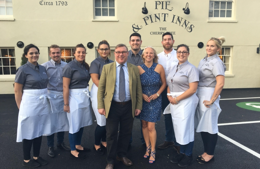 Rayleigh and Wickford MP Mark Francois pictured with co-owner Lisa Honeyman and her staff at the reopening of The Cherry Tree Pub on the Stambridge Road.