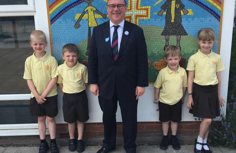 Rayleigh and Wickford MP Mark Francois pictured with pupils who helped to create a new religious mural at Wickford C of E Infant School.