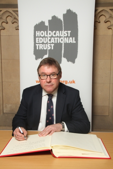 Mark Francois singing the Holocaust Educational Trust Book of Commitment  